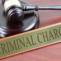 Do criminal charges stop showing up after 7 years in Georgia?